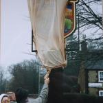 The cloth covering teh sign was reluctant to  come off when Barbara Chapman pulled on it - Barry Dixon helped to disentangle it!